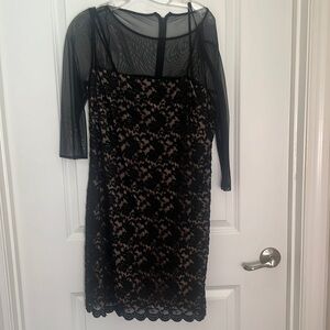 Midi size 12 elegant cocktail dress with detail hem and sheer top.